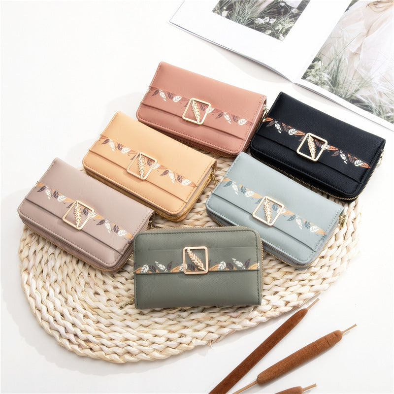 Cartera de cuero con clip para dinero con estampado de botones a presión para mujer